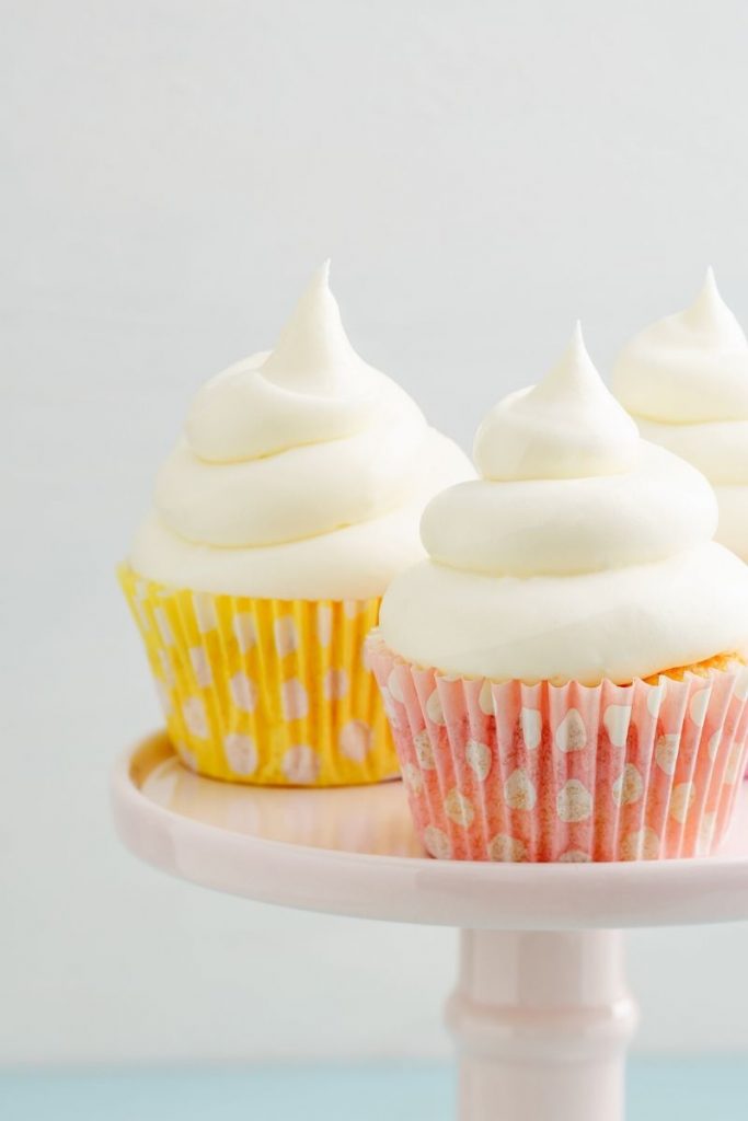 vanilla cupcakes on a white plate