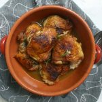 Chicken Scarpariello in orange stoneware