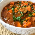 Pork & Sweet Potato Stew in a white bowl