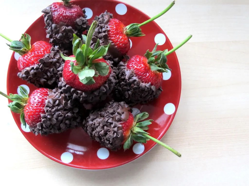 Chocolate Covered Strawberries on a polka dot dish