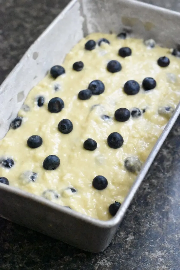 blueberry bread in a loaf pan