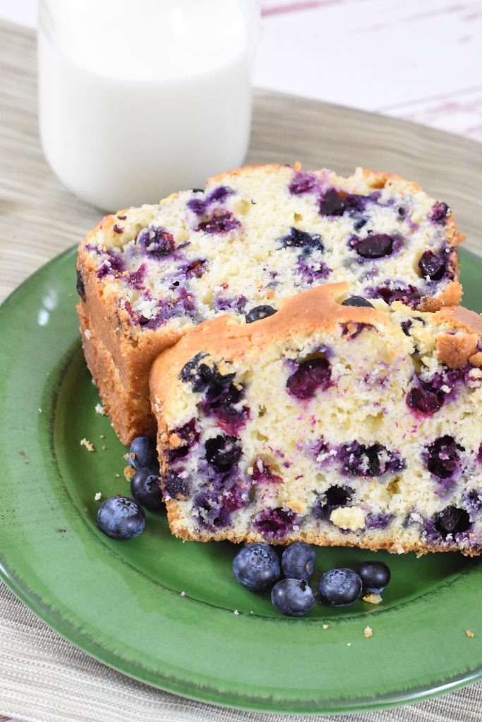 blueberry bread on a green plate