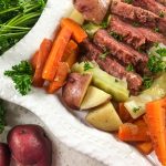 corned beef and cabbage on white plate