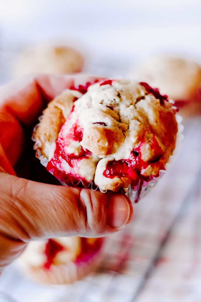cranberry orange muffins on a plate