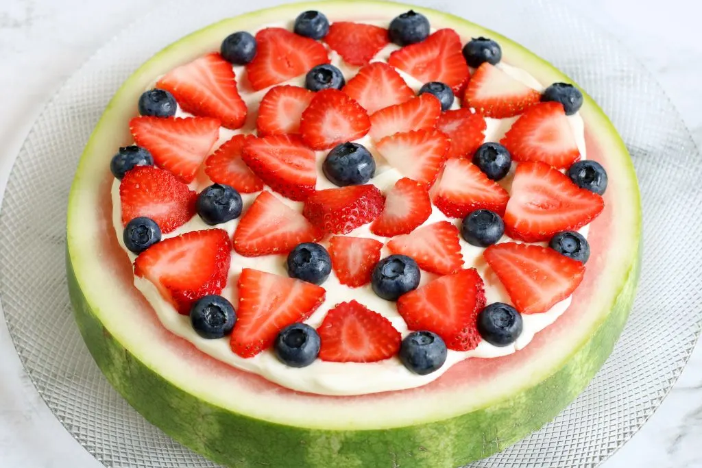 Decorate watermelon pizza as desired with fruit