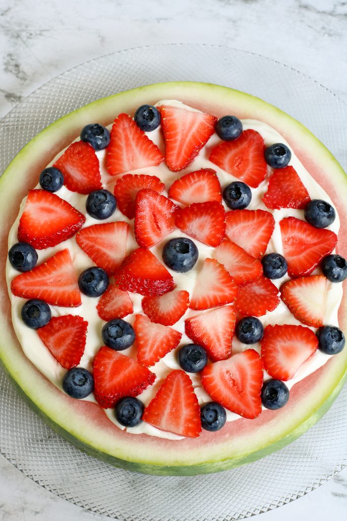 Decorate watermelon pizza as desired with fruit
