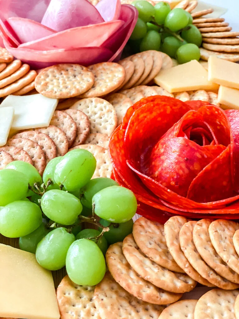 Learn how to easily create the viral Tik Tok food hack to making Salami Roses to put on a charcuterie board!
