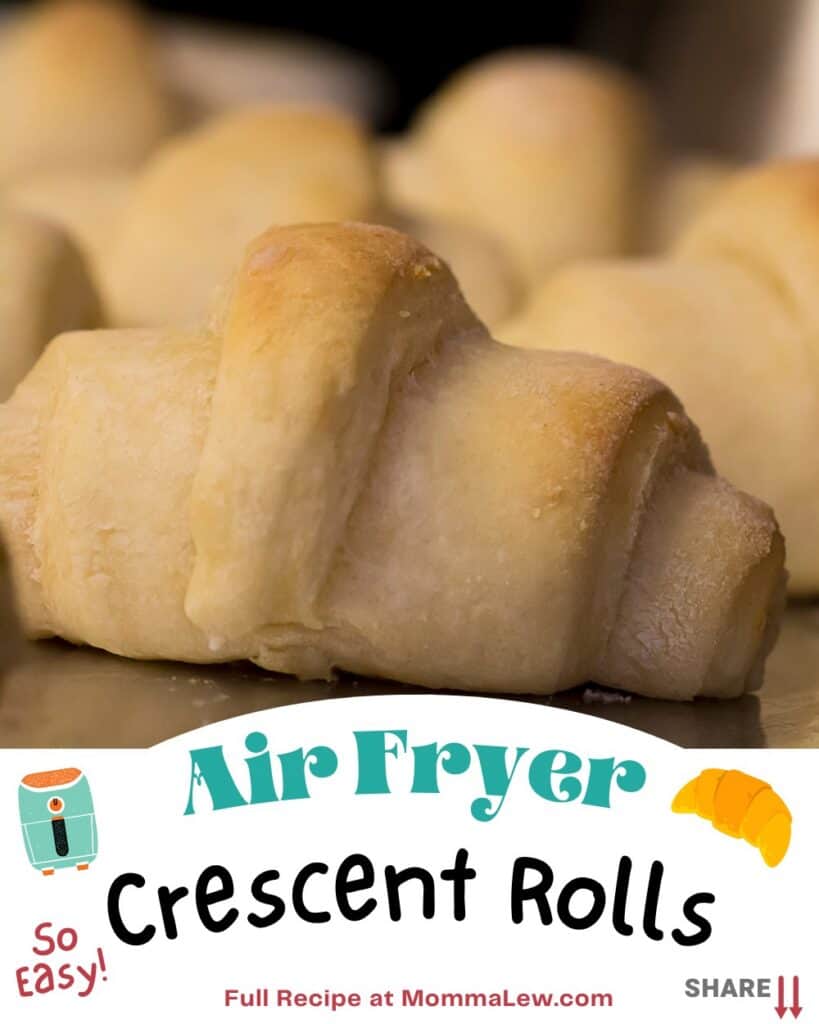 Freshly baked crescent rolls in air fryer on a tray, with text overlay reading Air Fryer Crescent Rolls - So Easy! Full recipe at MommaLew.com and small graphics of an air fryer and croissant.