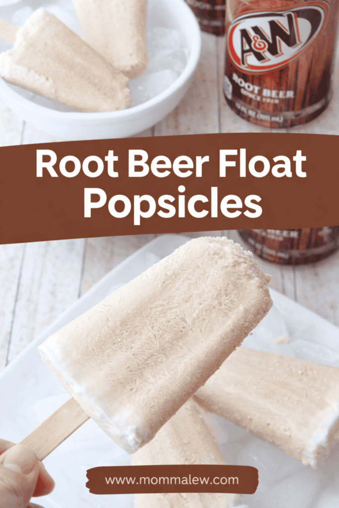 A hand holds a creamy root beer popsicle over a plate of more root beer popsicles. A&W root beer cans and a bowl with extras sit in the background. Text reads “Root Beer Float Popsicles” and “www.mommaleew.com”.